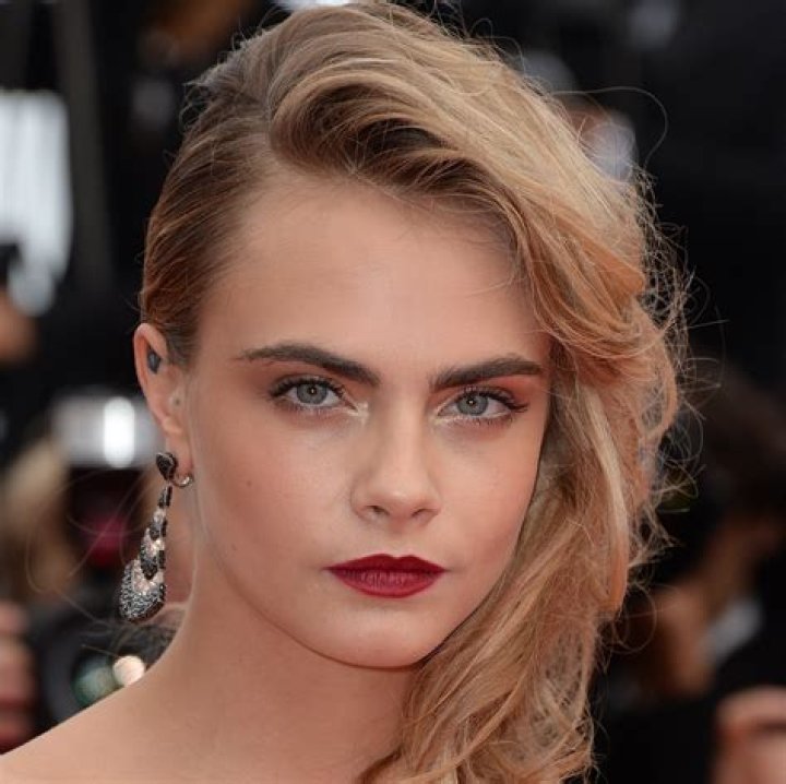 Cara Delevingne Embraces Spring In A Tiny Dogtooth Print Bikini & Hawaiian Shirt — Pics