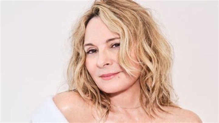 Kim Cattrall Rocks Plunging One-Piece Swimsuit In New Photo – Hollywood Life